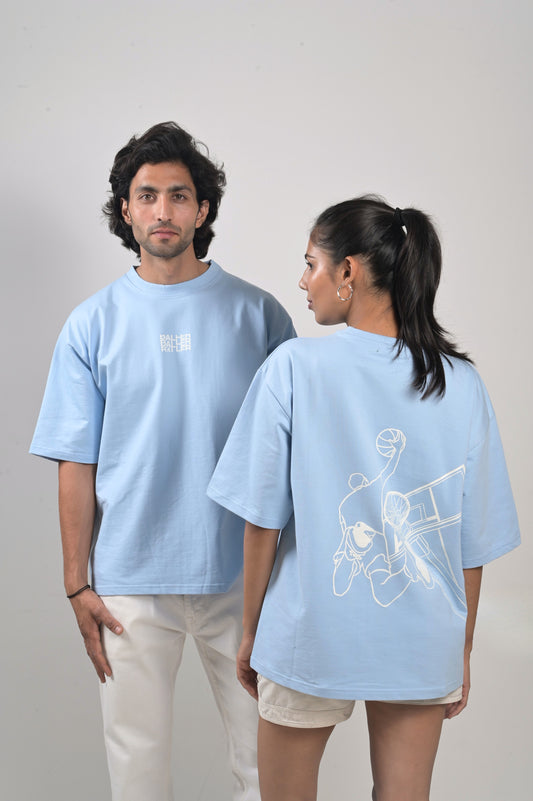 "Unisex oversized white cotton t-shirt with basketball graphic on the back and 'baller' written on the front"